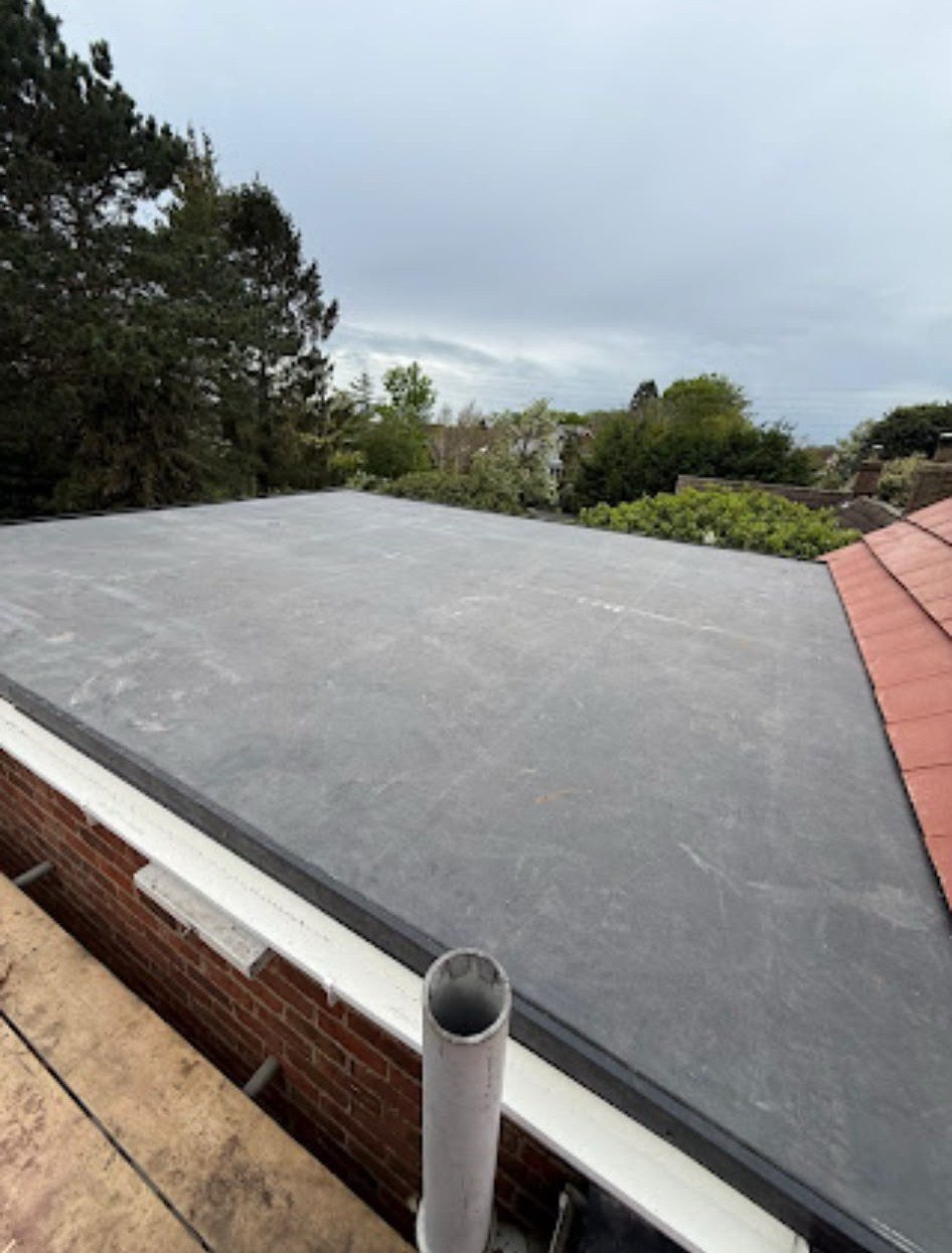 New rubber flat roof on a single-storey extension